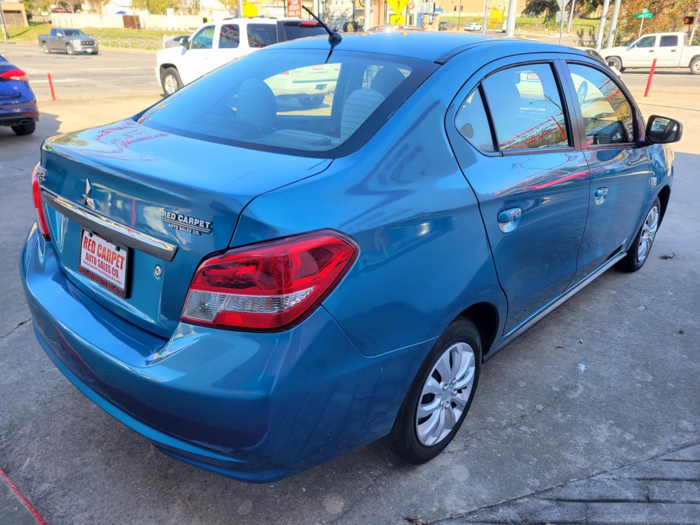 2020 Blue Mitsubishi Mirage G4 (ML32F3FJ1LH) with an 1.2L I3 F DOHC 12V engine, Automatic transmission, located at 503 West Court, Seguin, TX, 78155, (830) 379-3373, 29.568621, -97.969803 - Photo#2